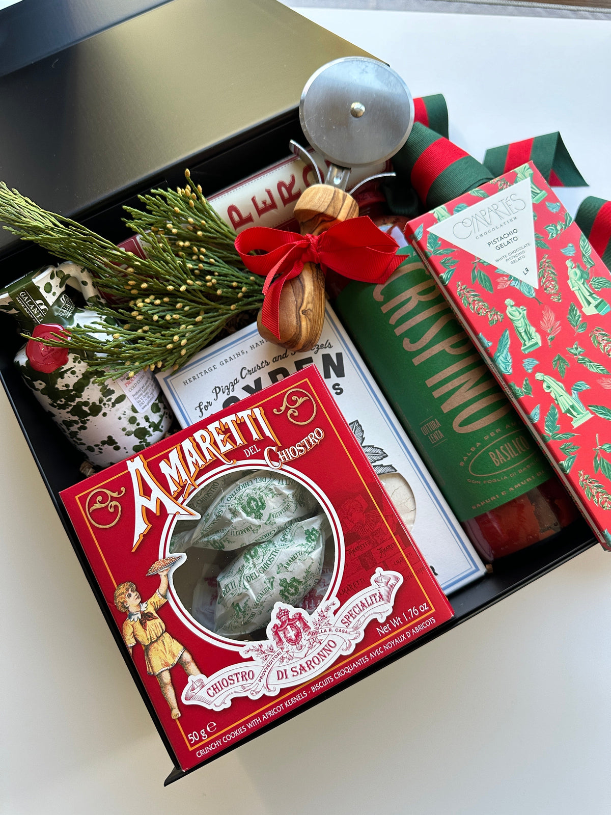Curated corporate gift assortment featuring gourmet foods, entertaining items, and beautifully packaged gifts