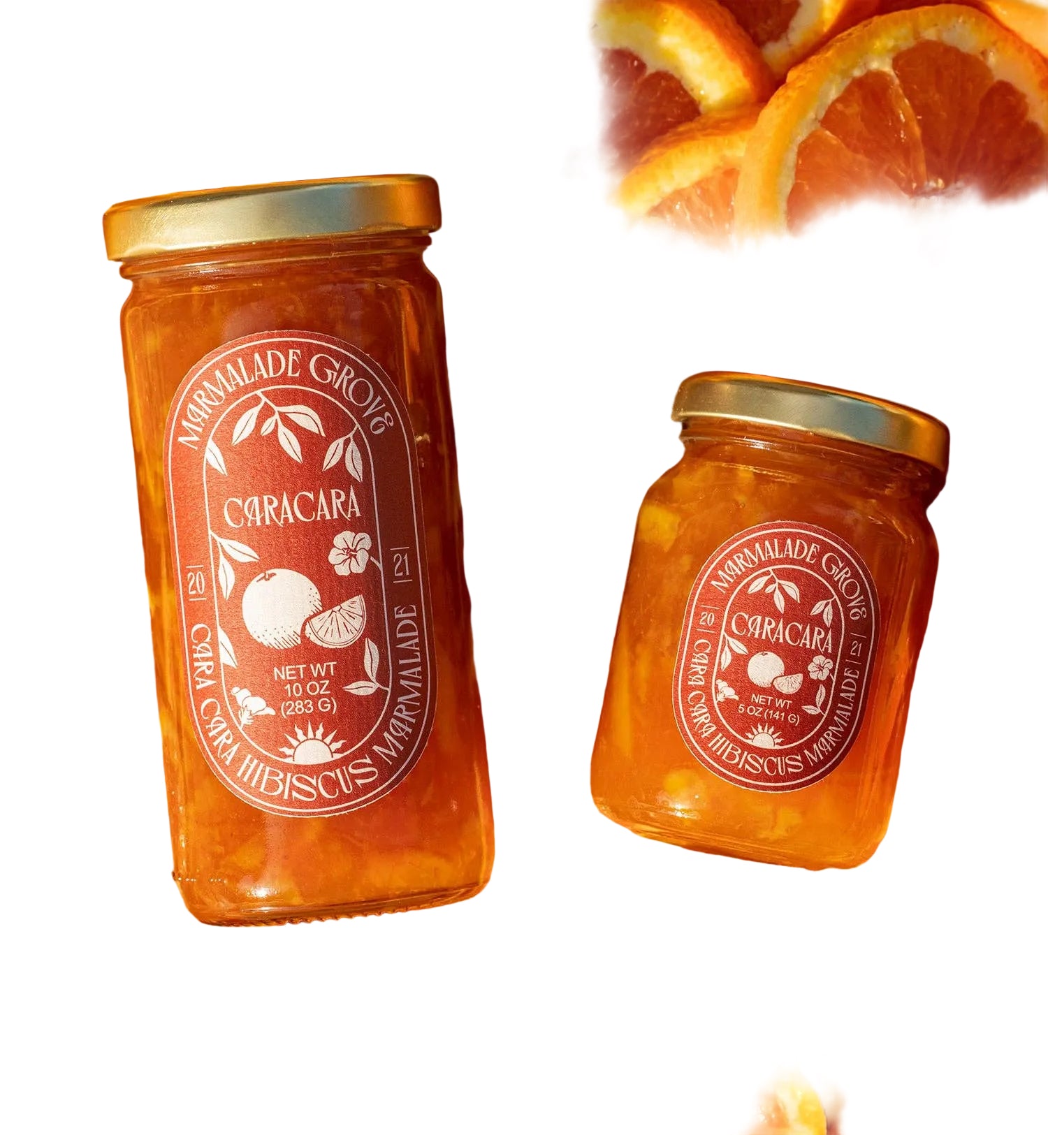 Jar of Marmalade Grove Cara Cara and Hibiscus Marmalade spread with vibrant orange color and floral hibiscus pieces visible inside.