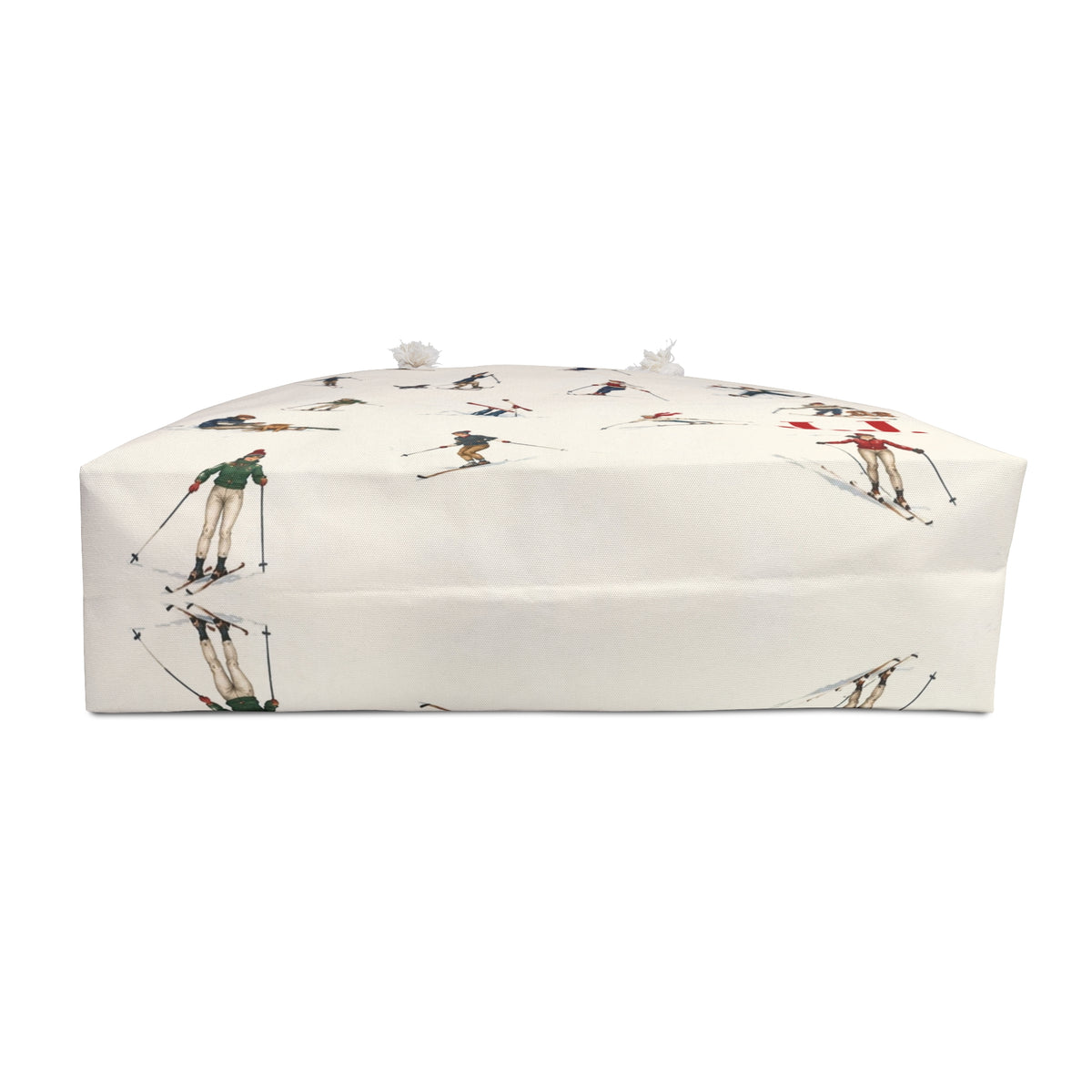 A rectangular box with a white background printed with a vintage-style pattern of skiers and snowboarders, featuring small white pom-poms on top, photographed on a solid white background.