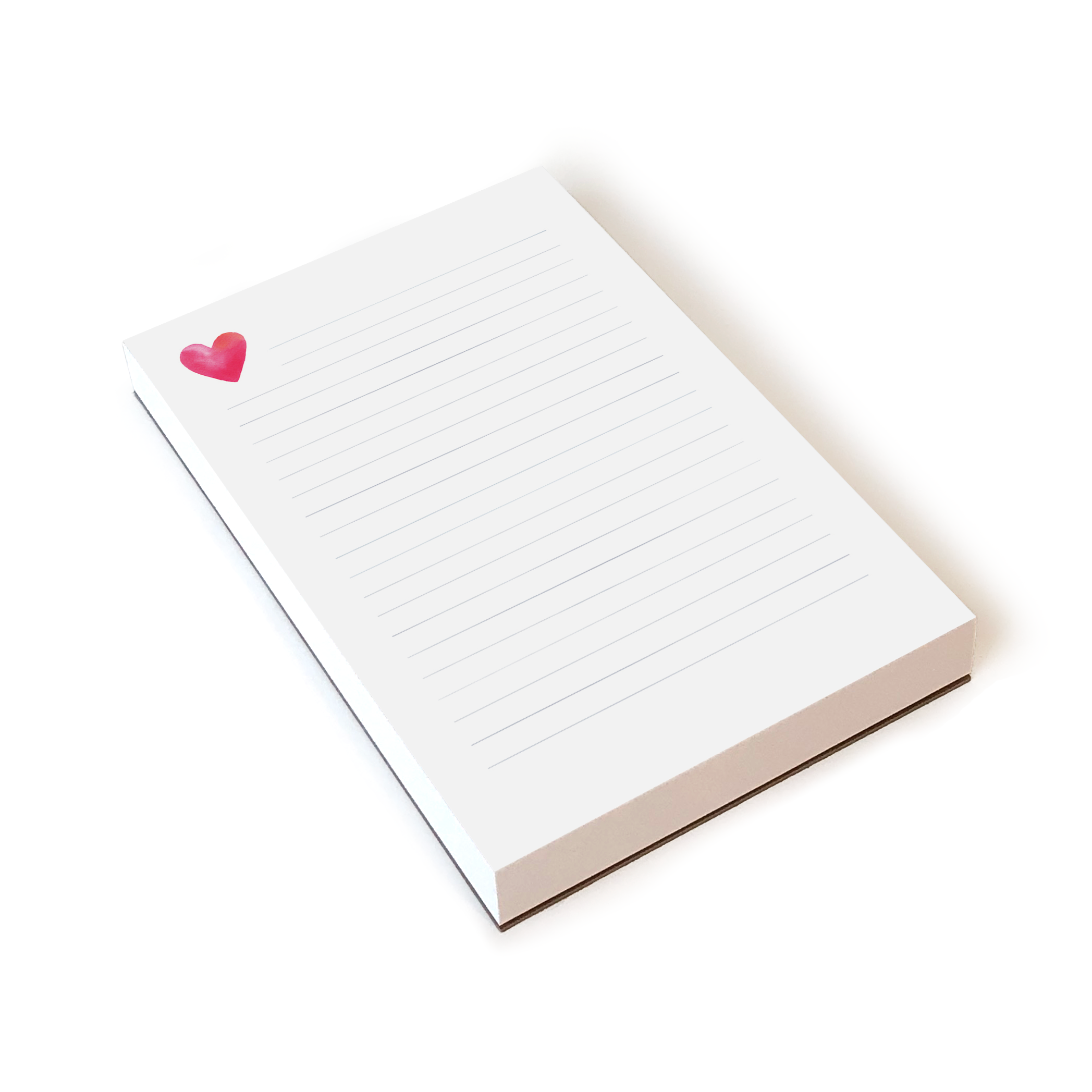 E. Frances Paper Heart Lined Notepad with pink and white cover, featuring lined pages for notes and writing.