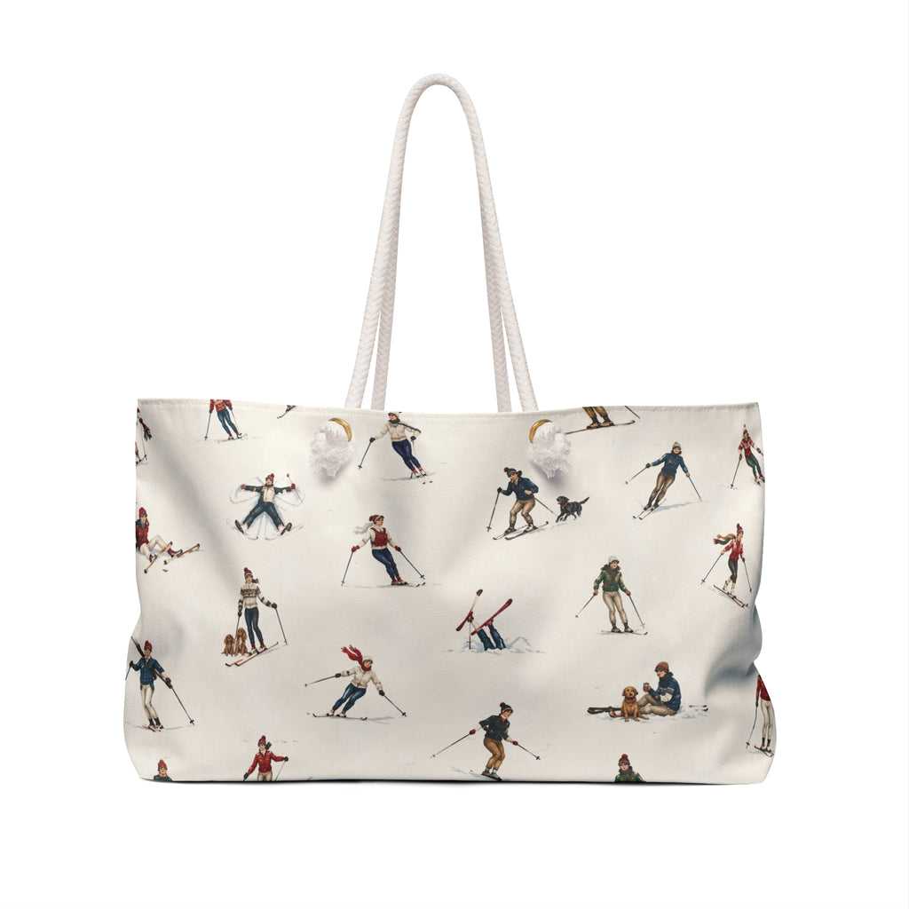 An off-white tote bag with a repeating pattern of vintage skiers and snowboarders, featuring two white rope handles and white drawstring ties, shown against a plain white background.