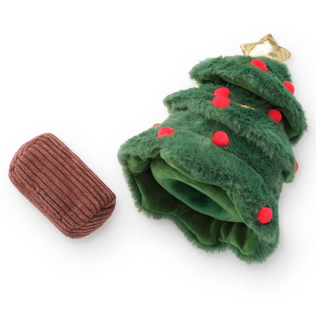 A plush Christmas tree-shaped pet blanket in green faux fur with red pom-pom accents and a gold star topper, shown next to its separate brown ribbed paw-shaped cushion on a white background.