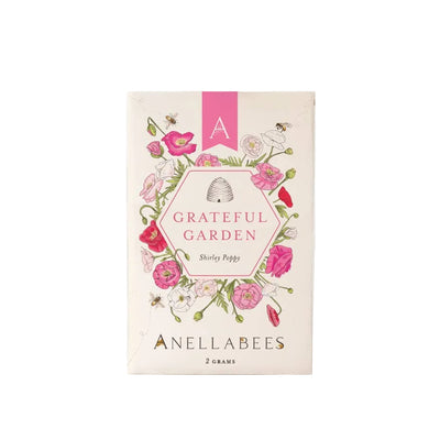 Anellabees Shirley Poppy flower garden seeds in packaging, ideal for planting bright red poppies in your garden.