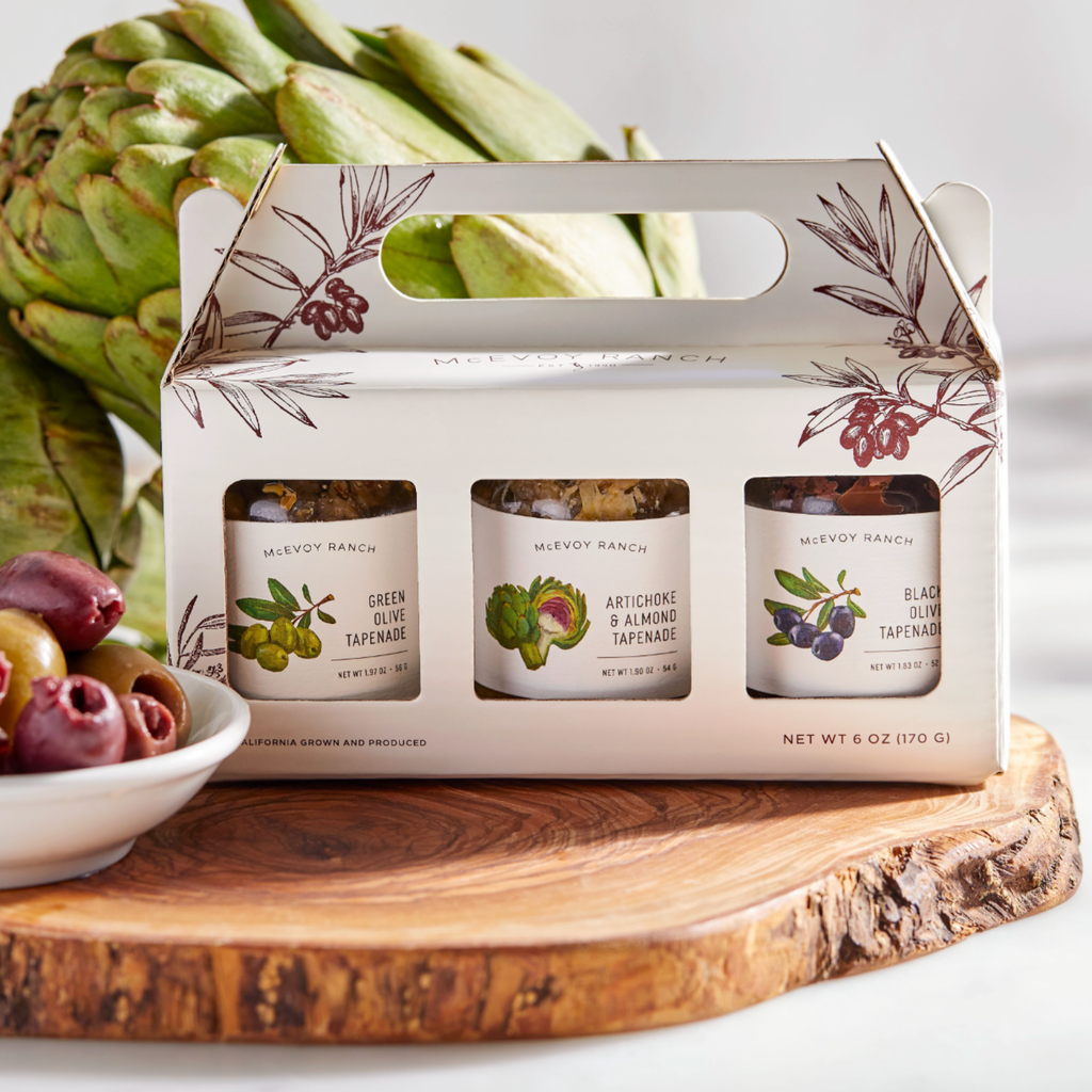 Mini Tapenade Gift Pack from McEvoy Ranch featuring assorted charcuterie-style tapenades in small jars.