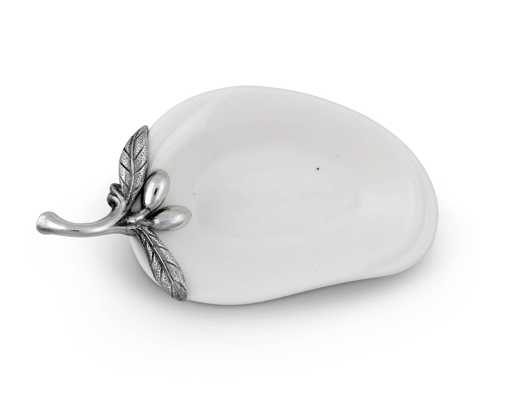 Vagabond House olive oil server with spoon rest, crafted in elegant metal design for kitchen or dining use.