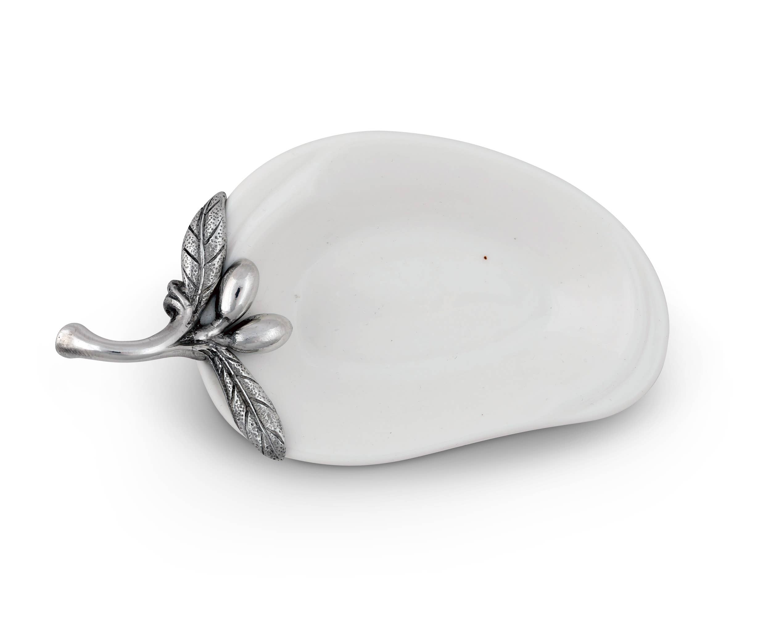 Vagabond House olive oil server with spoon rest, crafted in elegant metal design for kitchen or dining use.