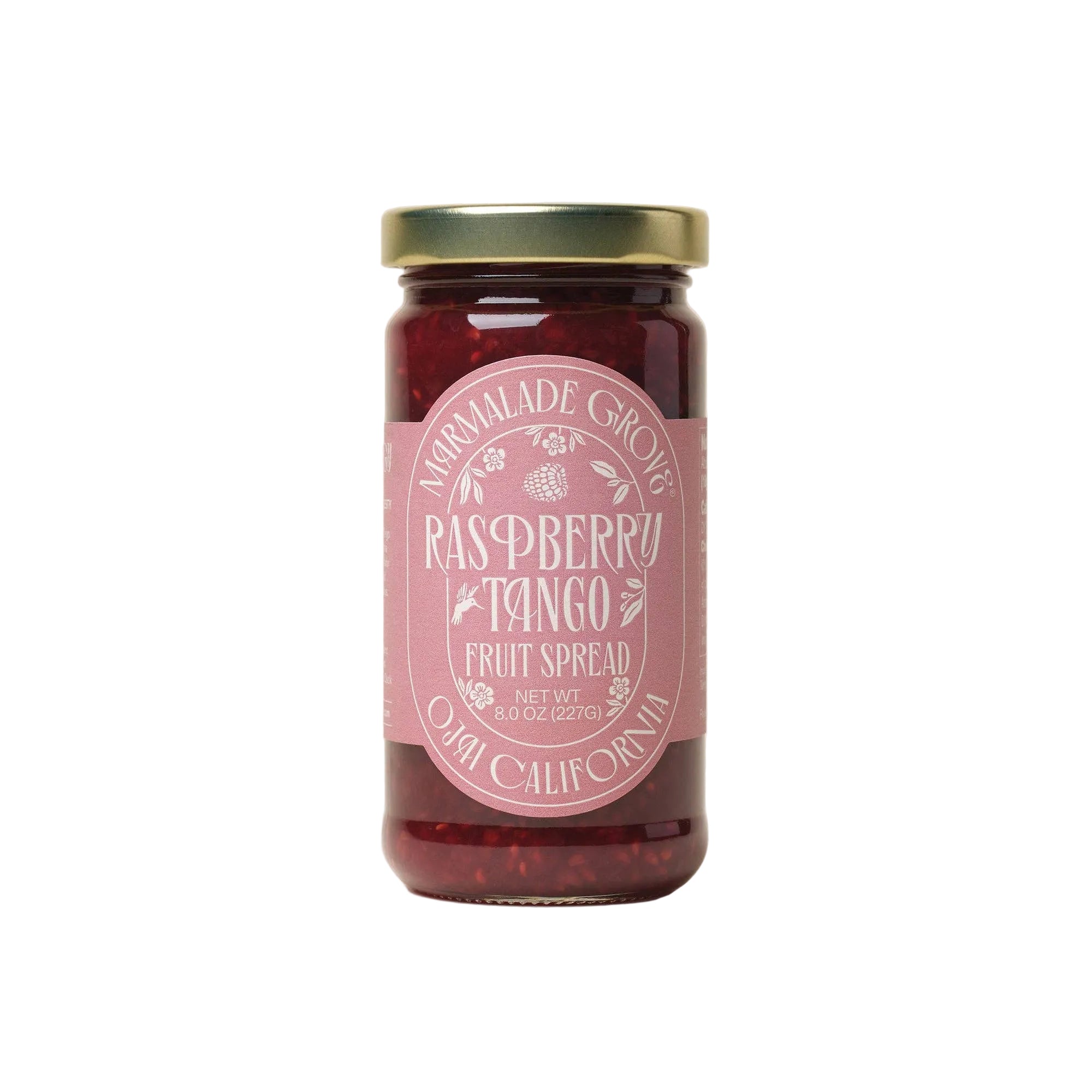 Jar of raspberry fruit spread with a pink label on a white background from Marmalade Grove in Ojai California.