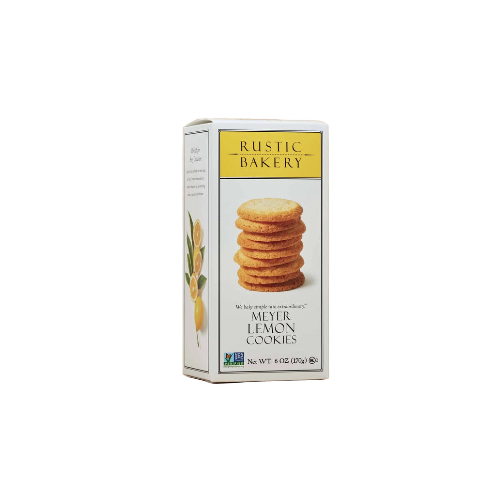 Rustic Bakery Meyer Lemon Cookies on a plate, showcasing golden-brown cookies with lemon zest and a sprinkle of powdered sugar.