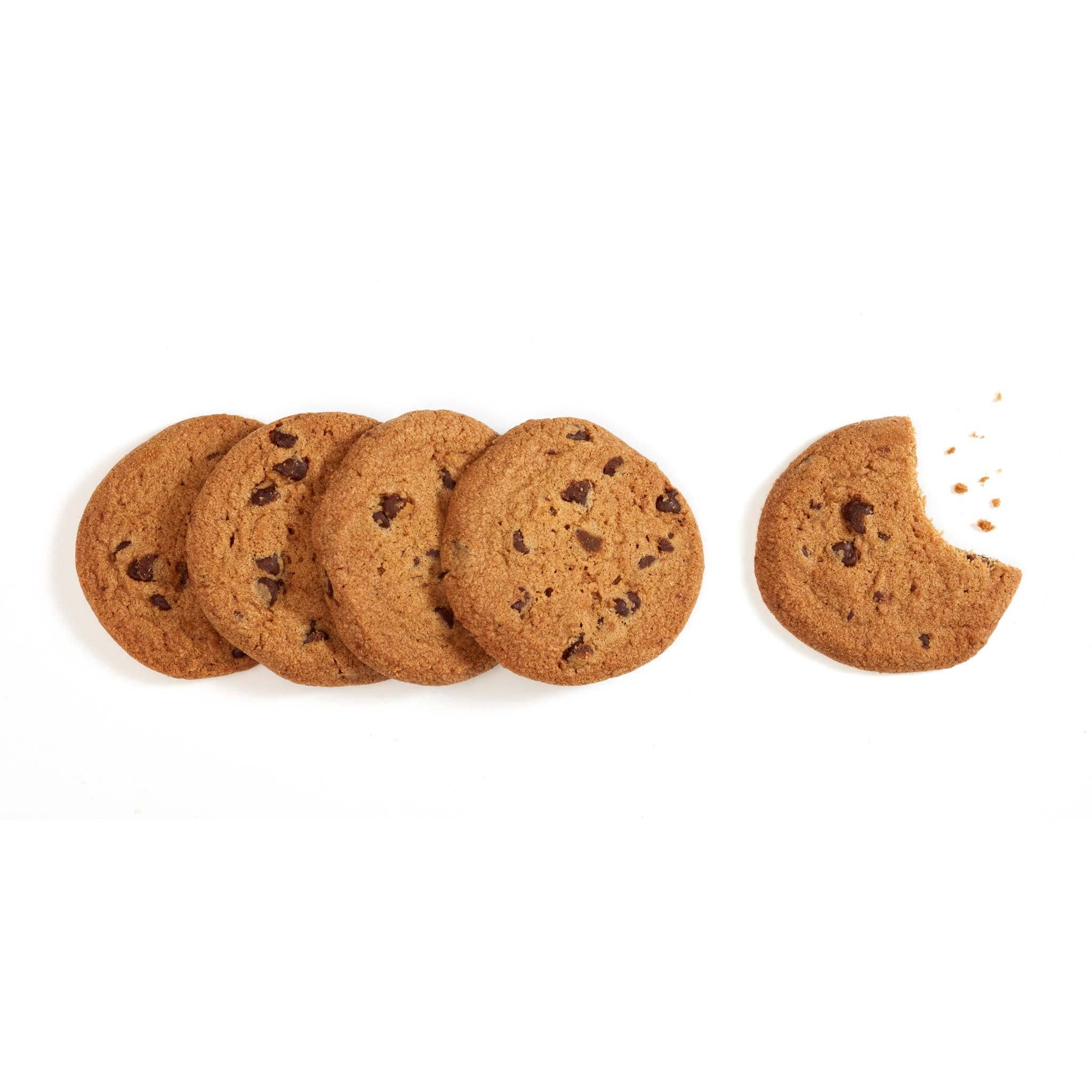 Rustic Bakery chocolate chip cookies on a plate with visible chocolate chunks and a rustic setting.