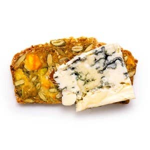 Apricot Cracker with blue cheese and honey on a white background