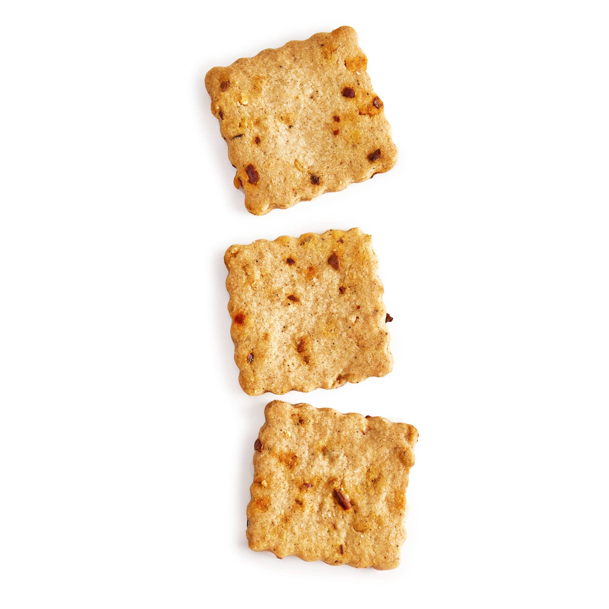Rustic Bakery Chipotle and Cayenne Crackers on a wooden surface, showing the spicy, flavorful crackers with a rustic texture.