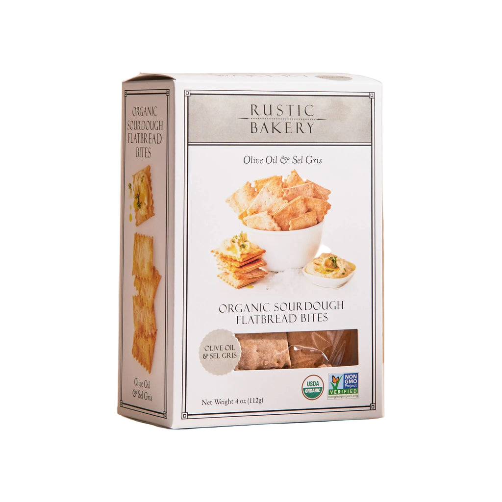 Rustic Bakery Bites box with olive oil and Sel Gris flavor, featuring 12 individually packaged snack bites on a neutral background.