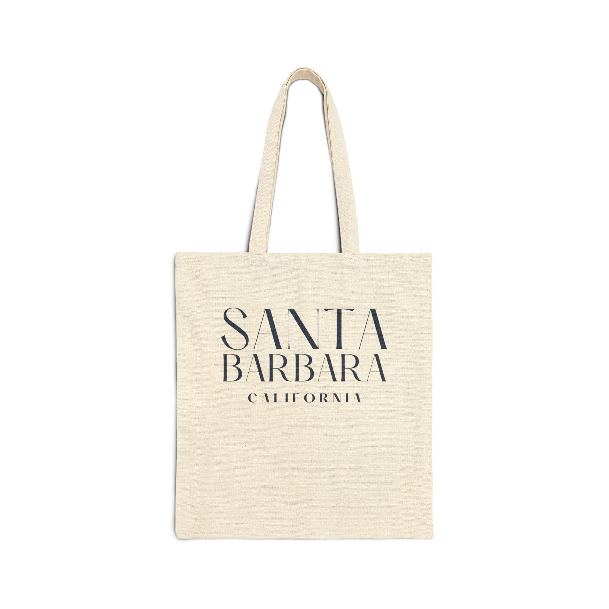 Beige tote bag with 'Santa Barbara California' text on a white background