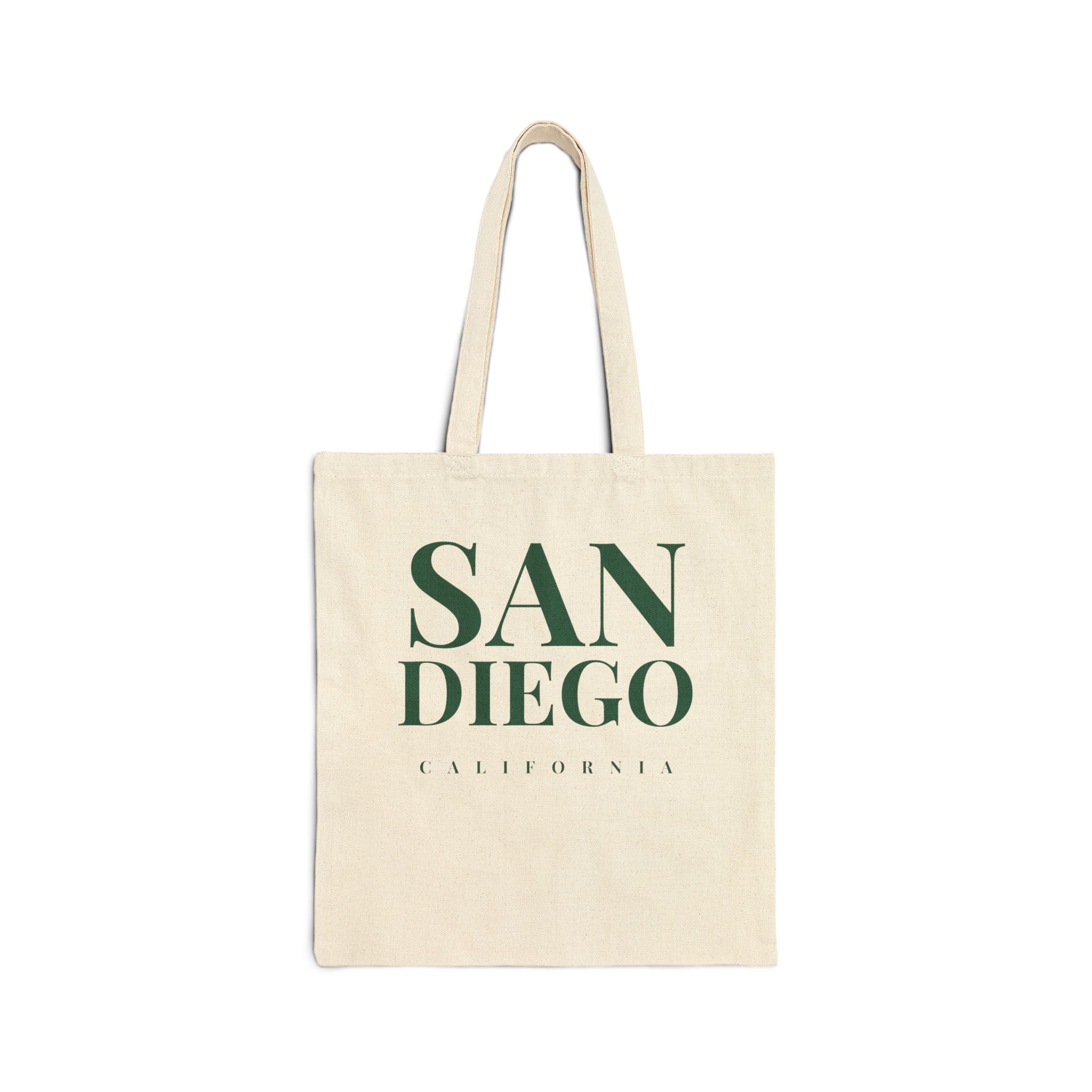 Beige tote bag with 'San Diego California' text in green on a white background