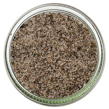Grey Salt Olive and Thyme in a glass jar, gourmet condiment from Sous Salt, with visible salt, olives, and thyme herbs inside.