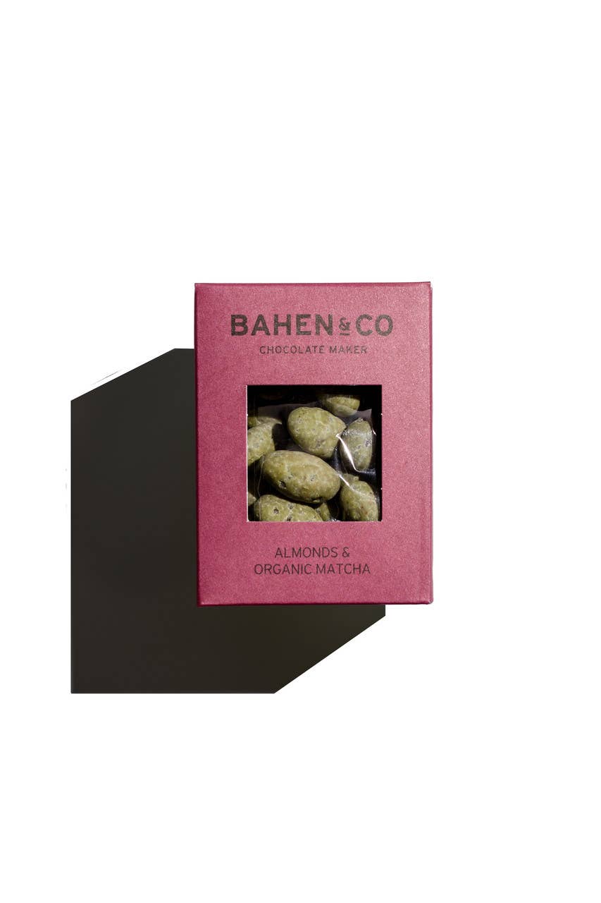Bahen & Co almond and organic matcha chocolate bar, showing the smooth chocolate with almond pieces and vibrant green matcha accents.
