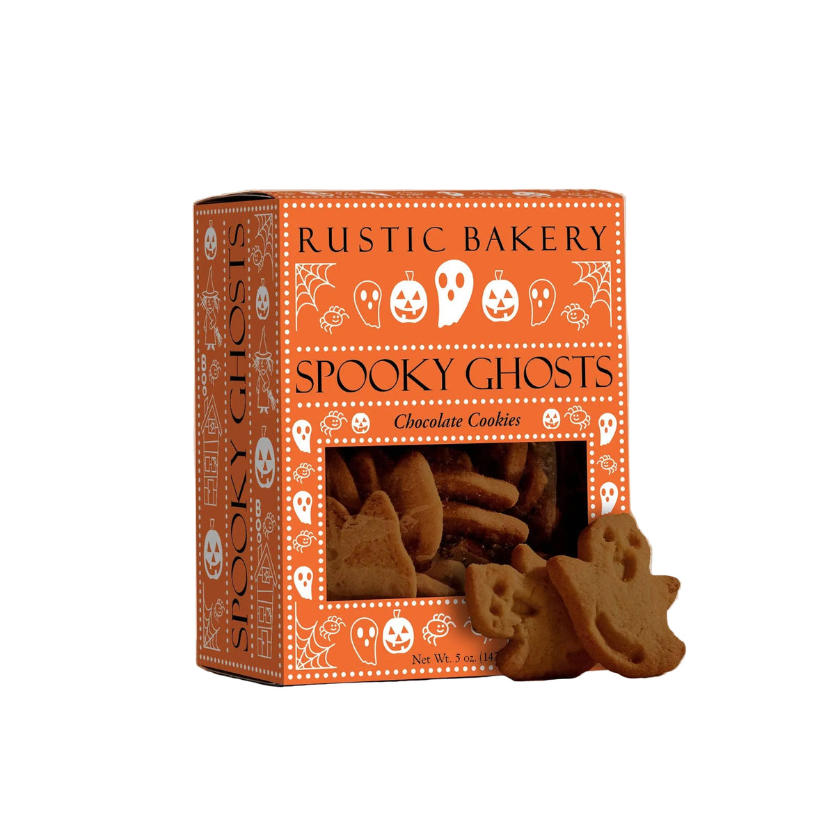 A box of Rustic Bakery Spooky Ghosts chocolate cookies on a light beige surface with a matching background. The orange packaging features white Halloween-themed illustrations, and several ghost-shaped cookies are displayed in front of the window.