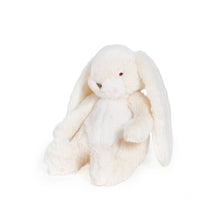 White plush bunny toy on a white background