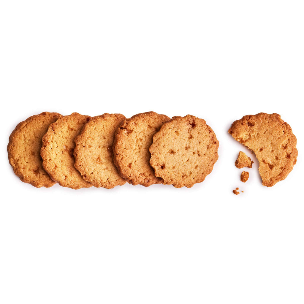 Rustic Bakery salted caramel shortbread cookies, golden-brown with visible caramel swirls and a crumbly texture.