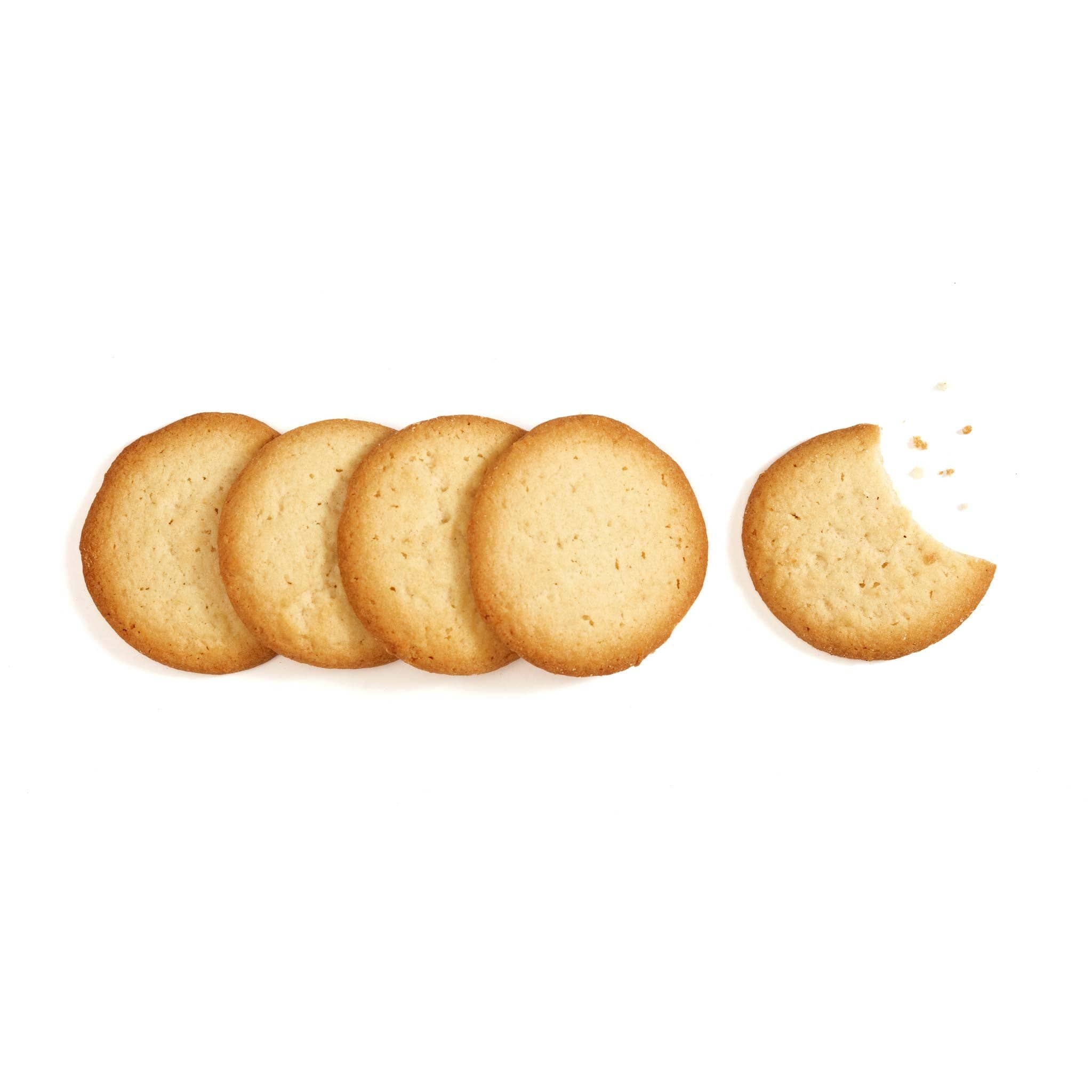 Rustic Bakery Meyer Lemon Cookies displayed on a plate with lemon slices, showcasing their golden-brown, citrus-flavored cookie appearance.