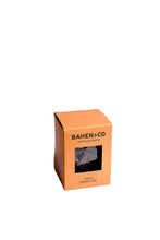 Bahen & Co. Confit Orange Chocolate bar with orange pieces and rich chocolate on a white background.