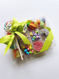 Poppins & Post Easter Snackle Box with assorted chocolates and candies, featuring colorful treats and festive packaging.
