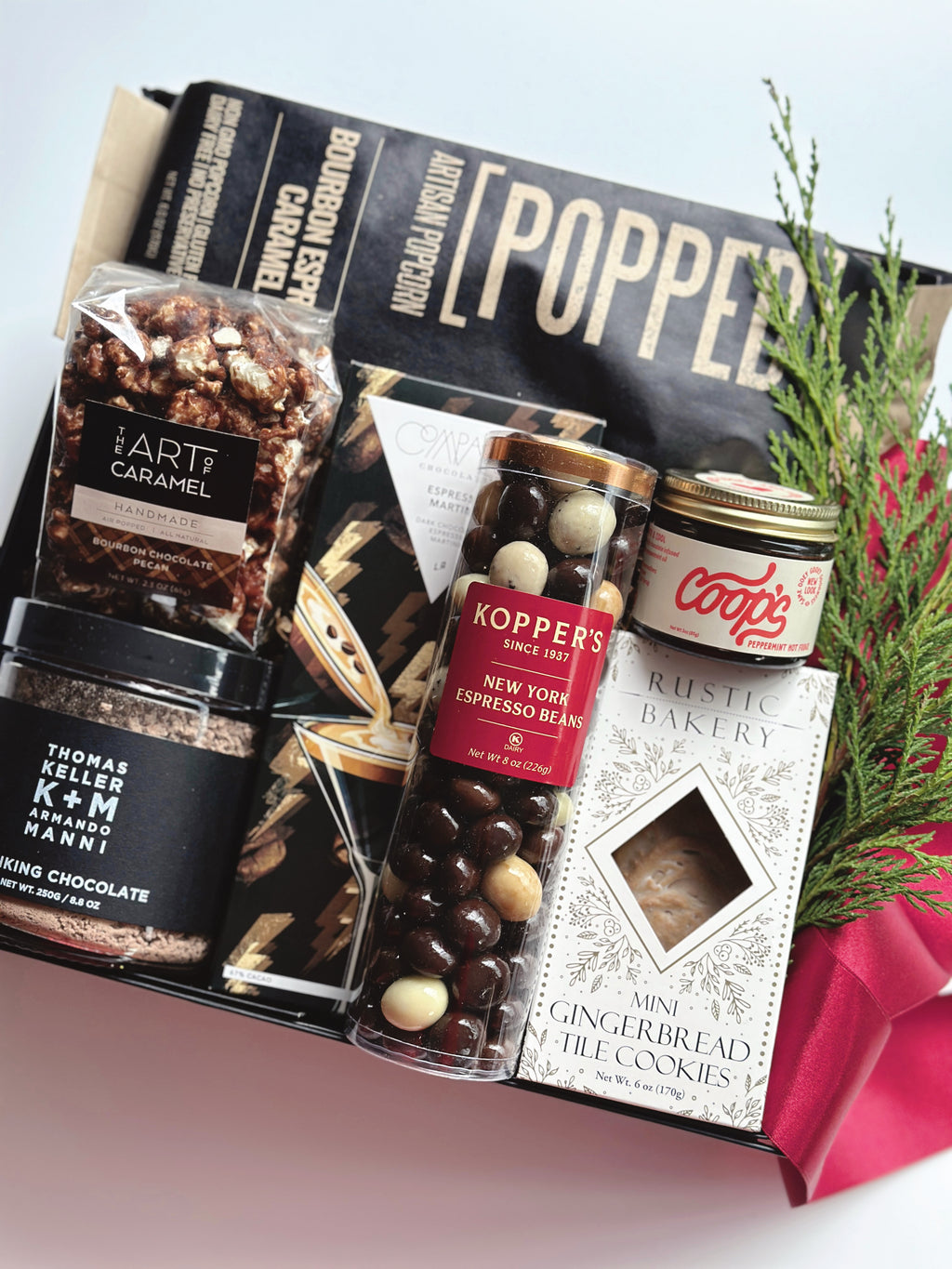 Poppins & Post gift box featuring rich espresso and dark chocolate, beautifully arranged with assorted chocolates and coffee treats.