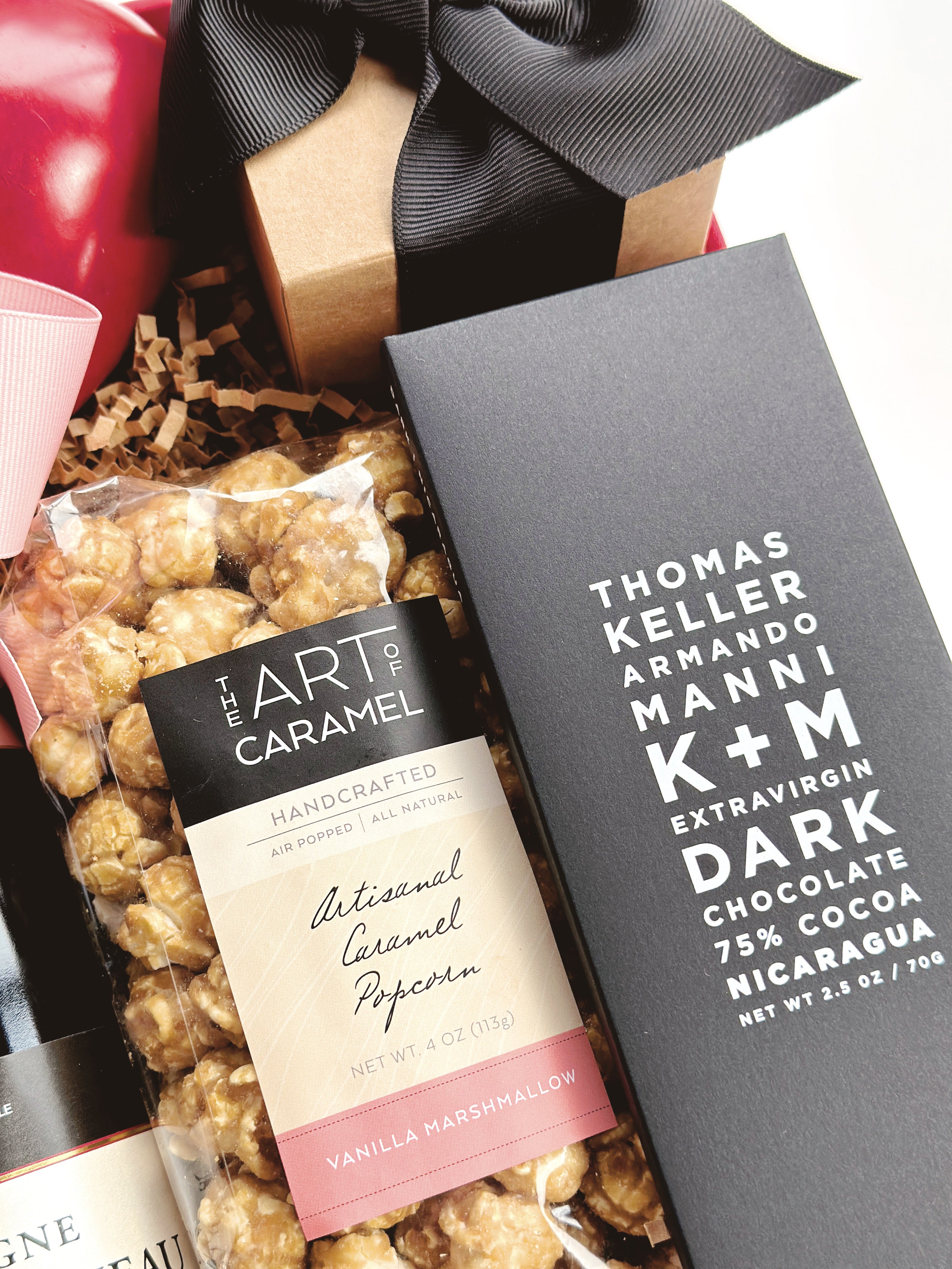 Colorful gift box from Poppins & Post's Happy Engagement! collection, filled with celebration-themed items and decorative elements.