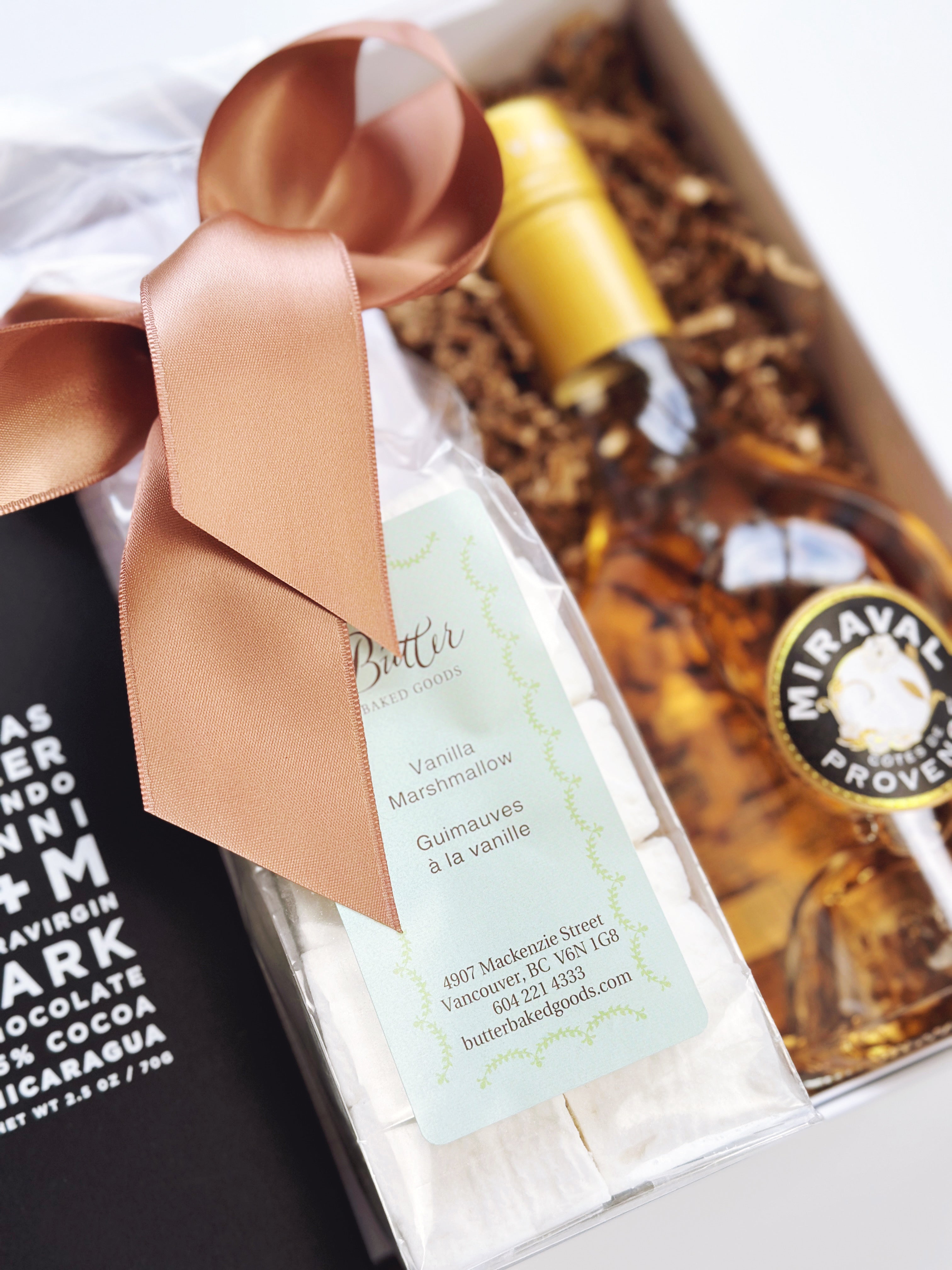 Poppins & Post "Thinking of You" gift box with decorative packaging and assorted thoughtful items inside.
