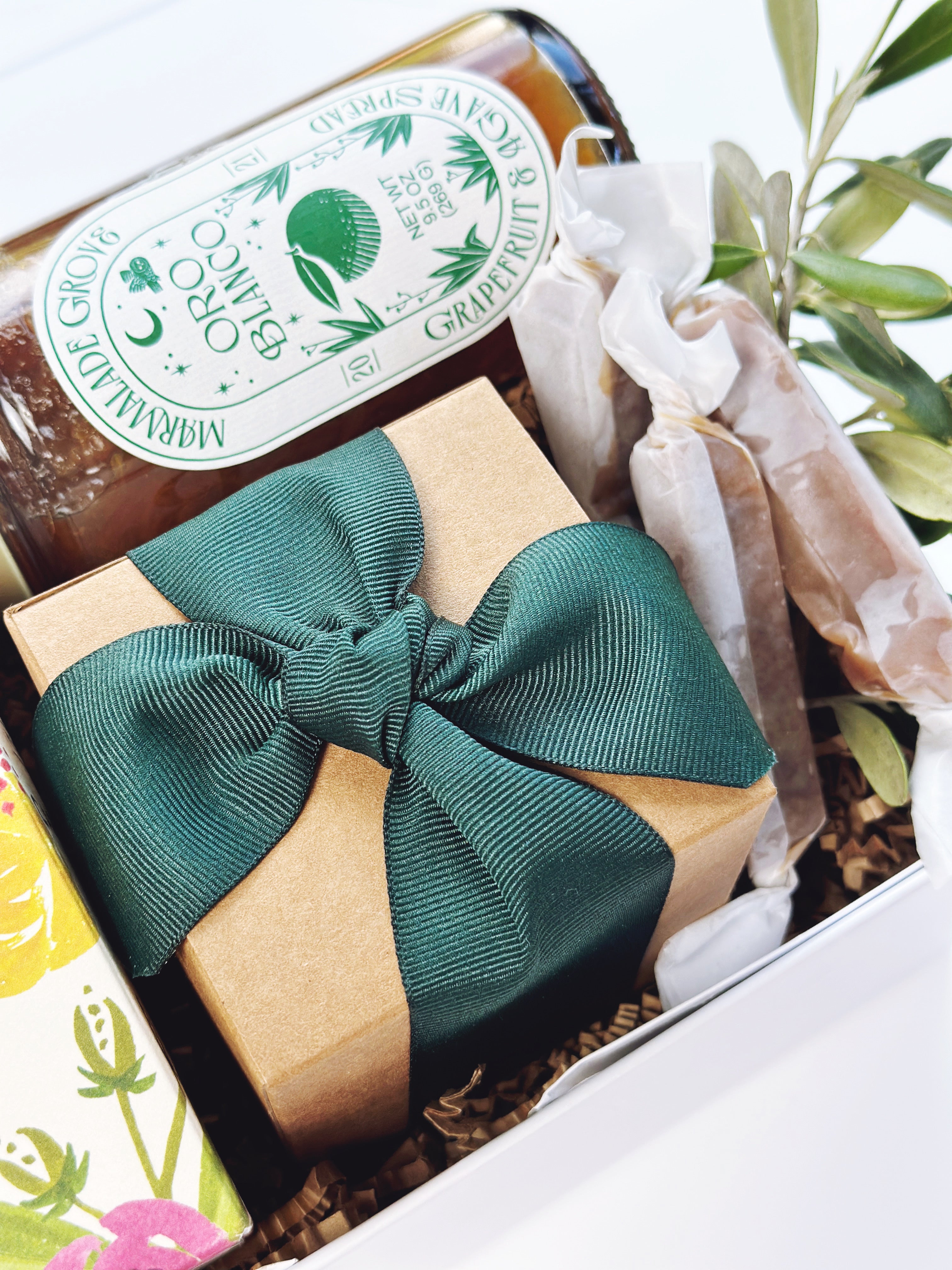 Colorful flowers in bloom gift box by Poppins & Post, showcasing vibrant floral arrangement in a decorative gift box.