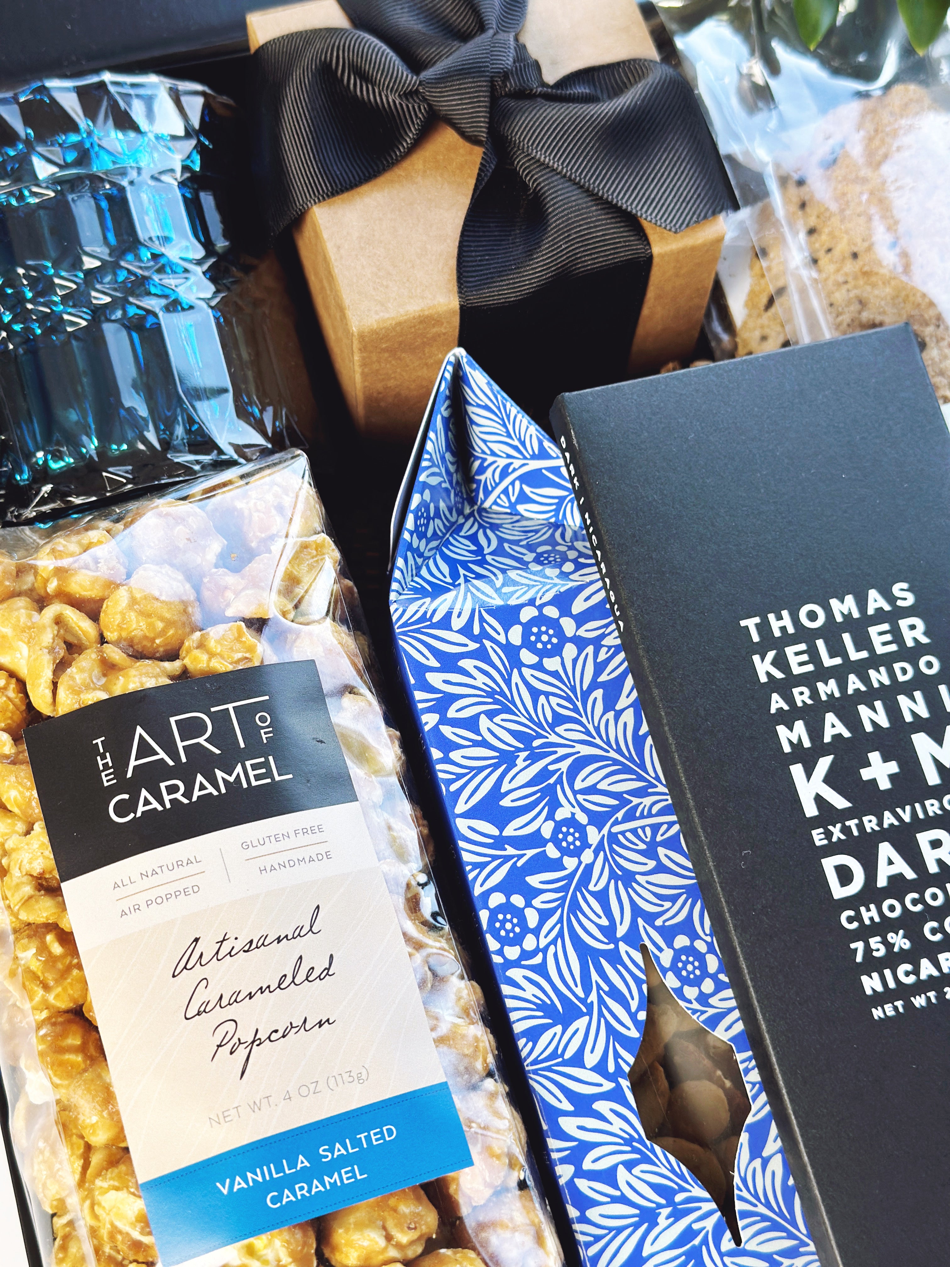 Gift box from Poppins & Post titled The Pacific, featuring a beautifully arranged assortment of gift items in a decorative box.
