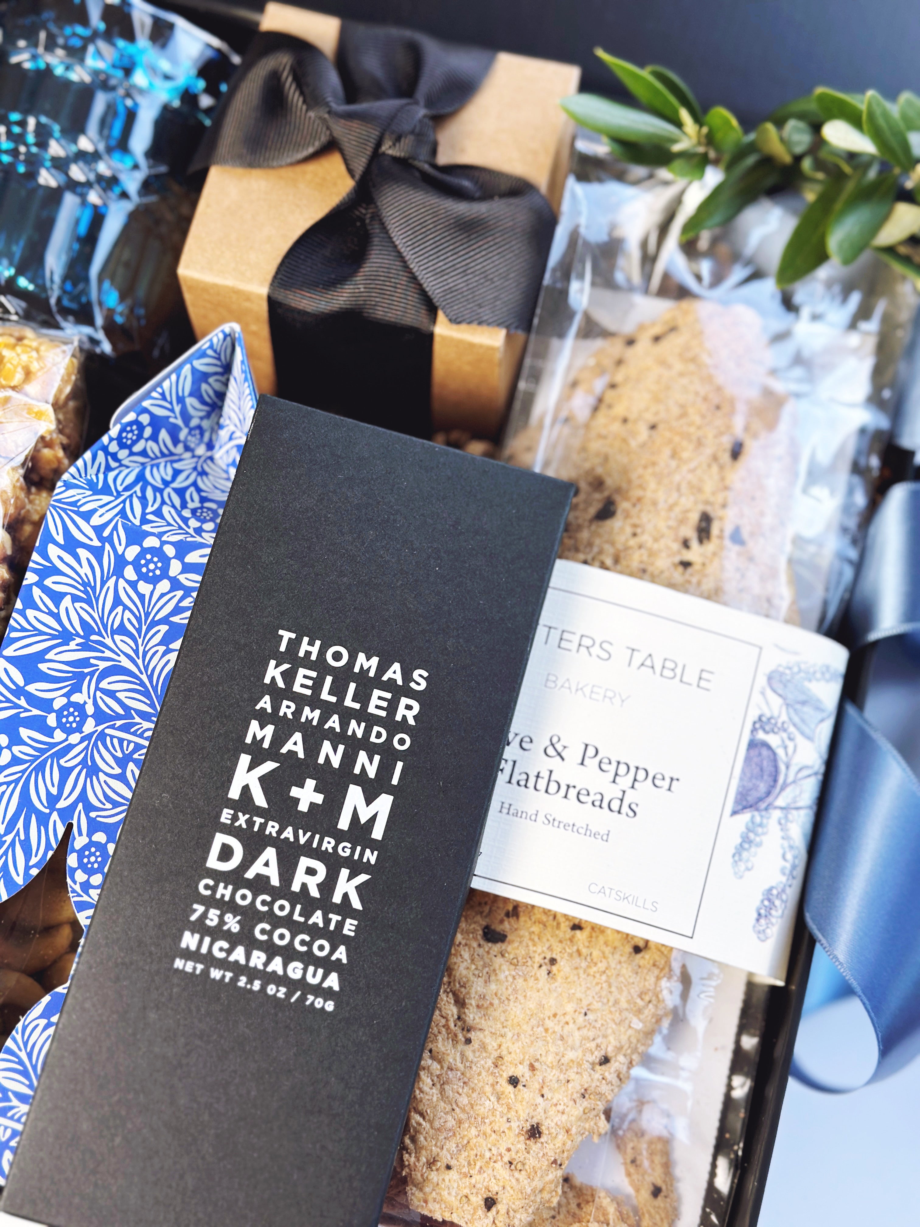 Poppins & Post The Pacific gift box with beautifully wrapped items and decorative ribbon, ready for gifting.