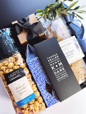 Poppins & Post The Pacific gift box with assorted chocolates in a decorative tin, perfect for gifting or special occasions.