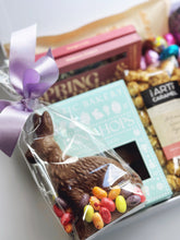 Colorful Deluxe Easter Box from Poppins & Post featuring curated festive gifts and decorative Easter-themed items.