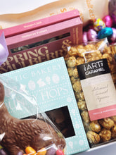 Deluxe Easter Box curated gift by Poppins & Post featuring colorful decorations, chocolates, and festive Easter treats.