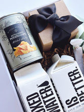 Sweet and salty wedding welcome favors by Poppins & Post, featuring colorful treats in a festive display for guests.