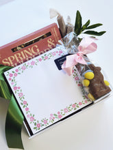 Spring Fling gift box by Poppins & Post featuring colorful floral packaging and neatly arranged treats inside.