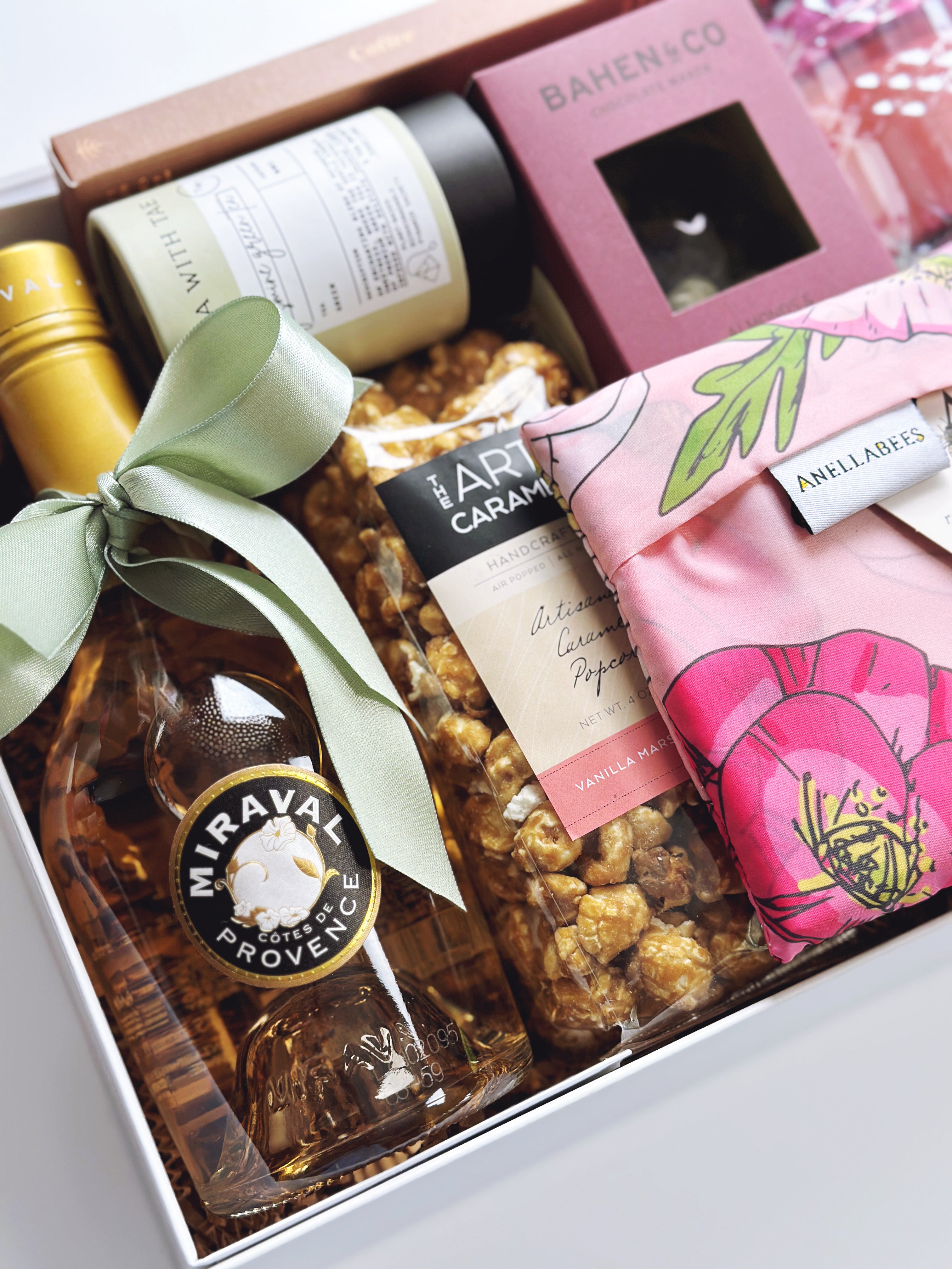 In Full Bloom gift box by Poppins & Post featuring colorful floral-themed packaging and assorted gift items.