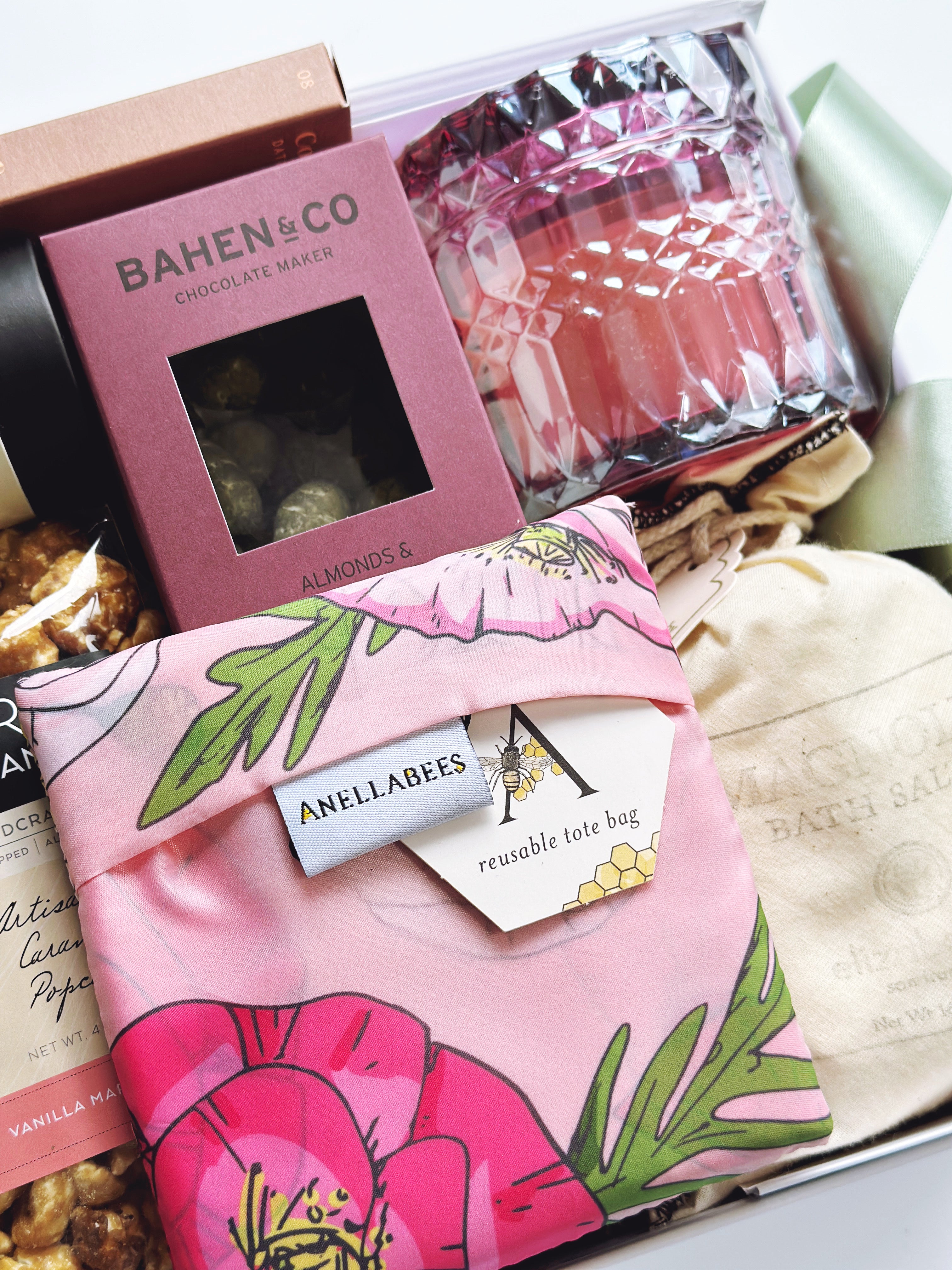 Poppins & Post In Full Bloom gift box with colorful floral-themed packaging and assorted gift items inside.