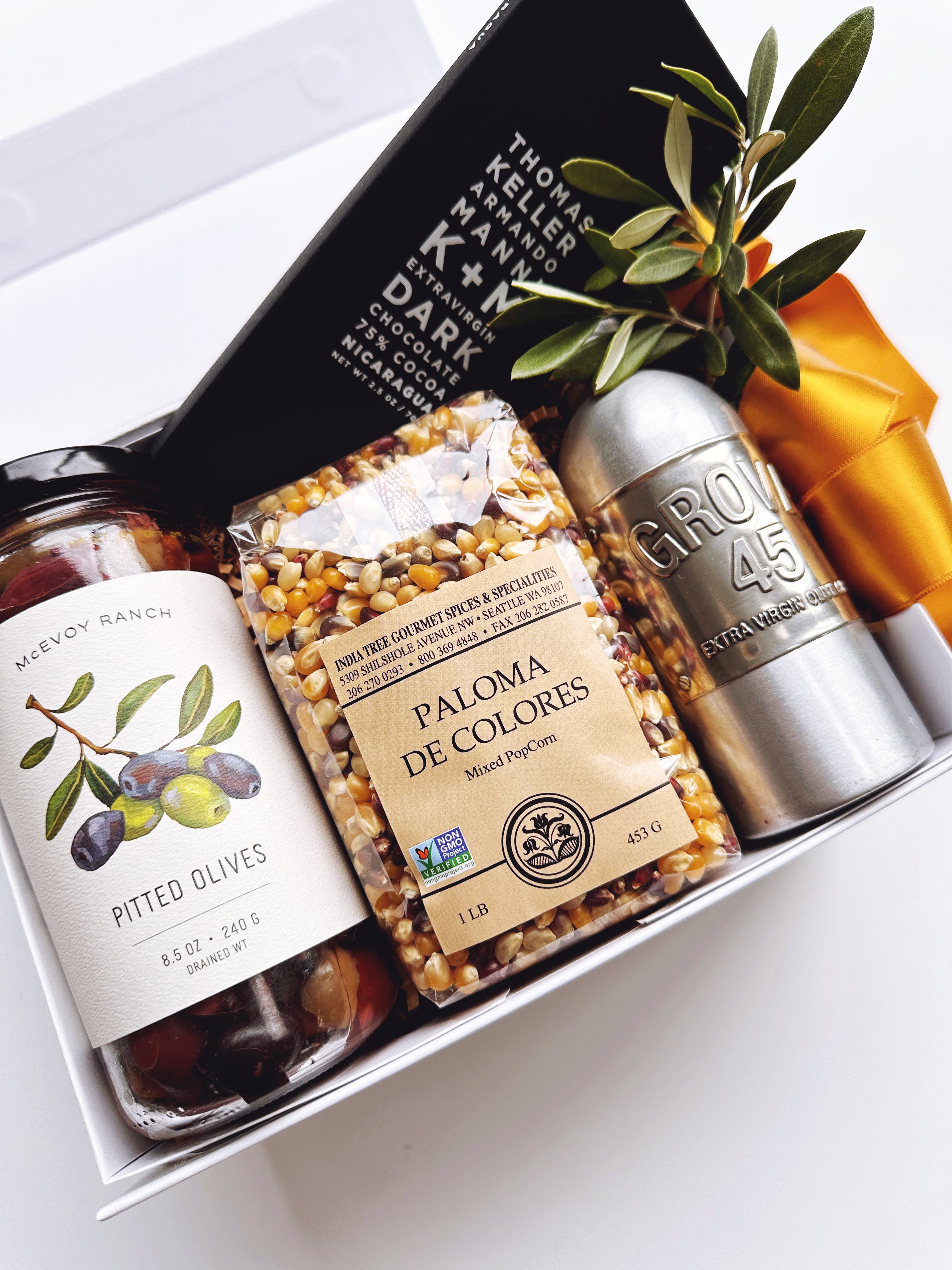 Poppins & Post Napa Valley Favorites Gift Box with assorted wines and gourmet treats, beautifully arranged in a decorative gift box.