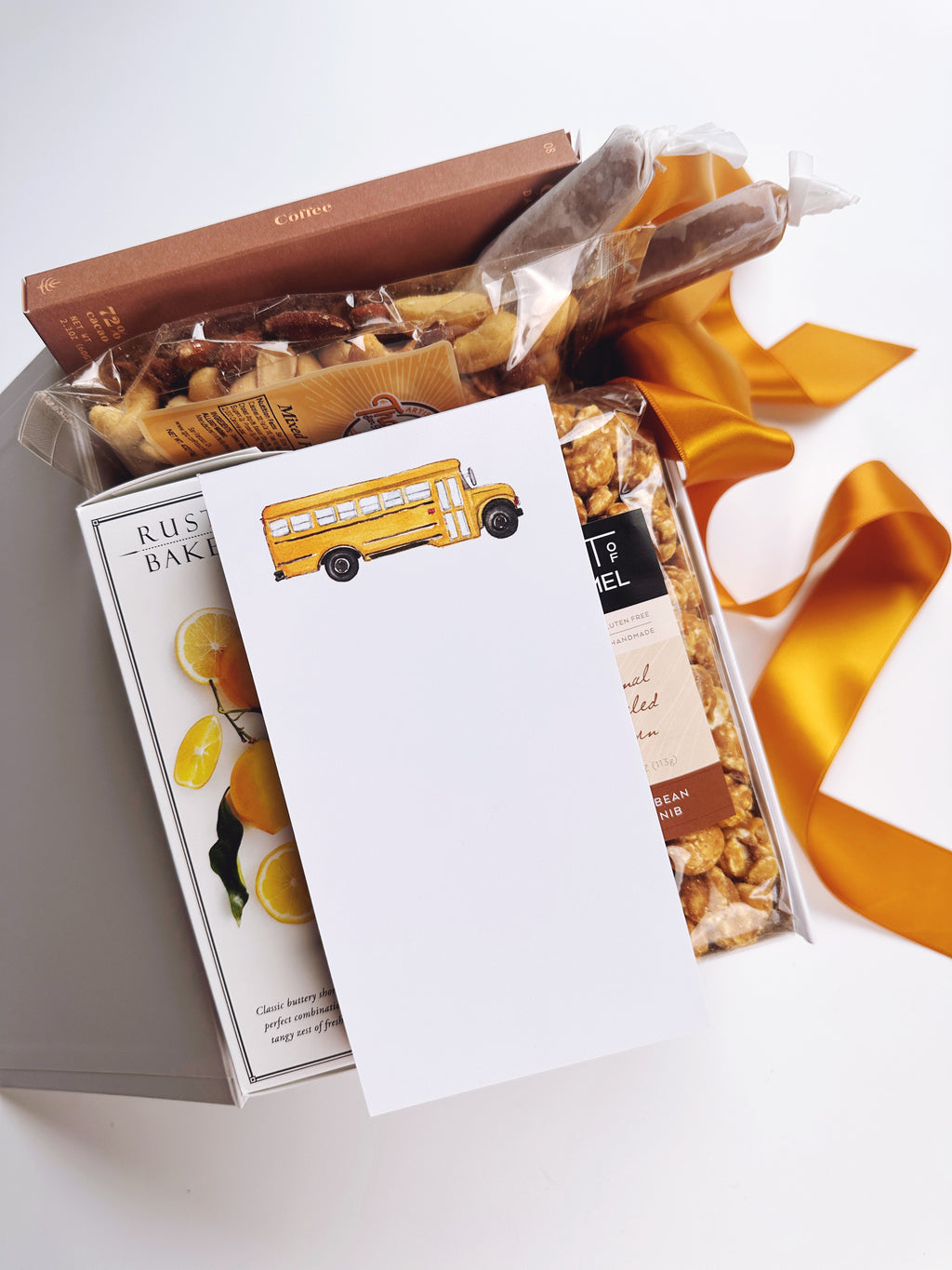 Teacher appreciation gift box by Poppins & Post, featuring colorful stationery and thoughtful gifts for educators.