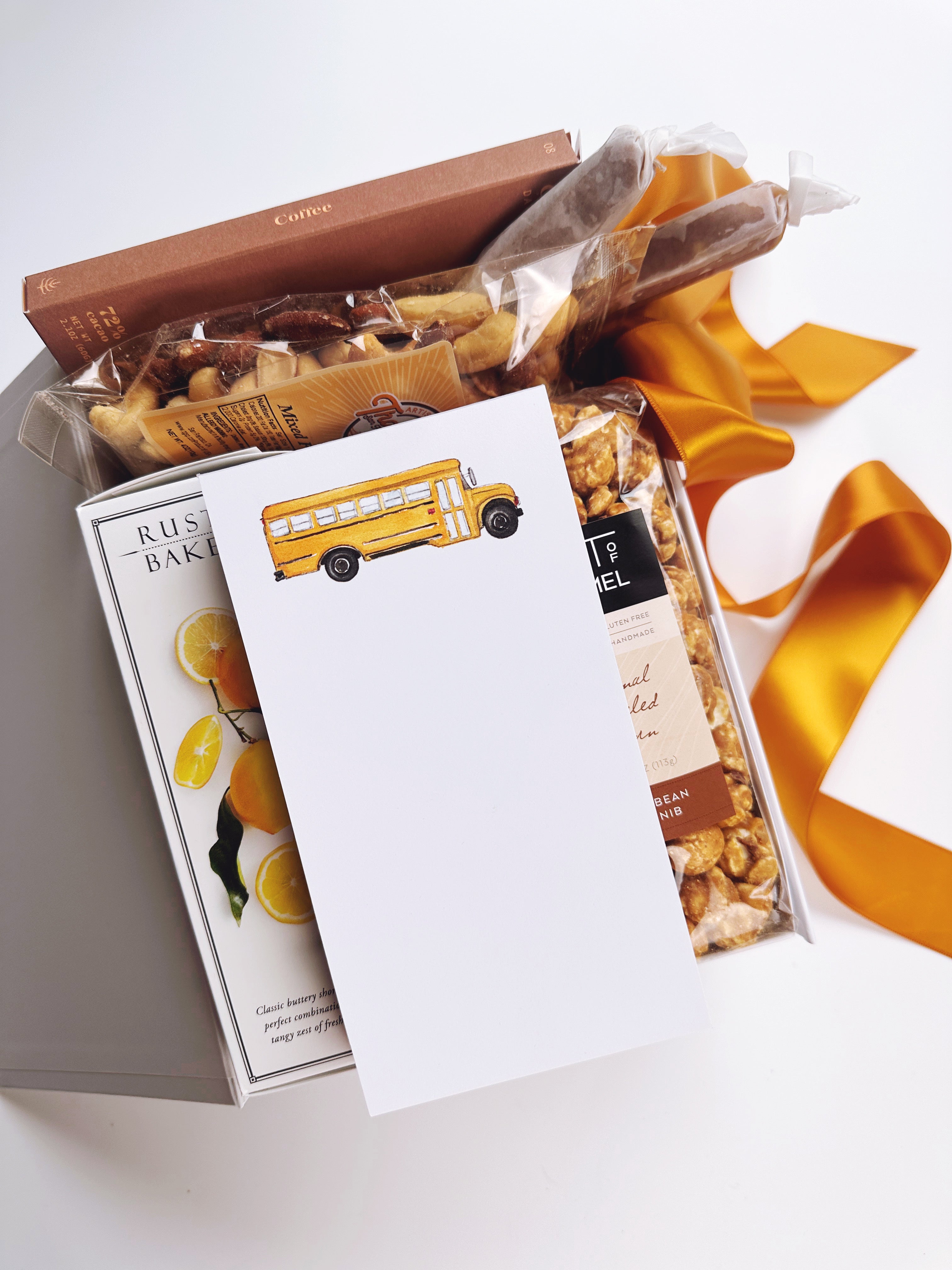 Teacher appreciation gift box by Poppins & Post, featuring colorful stationery and thoughtful gifts for educators.