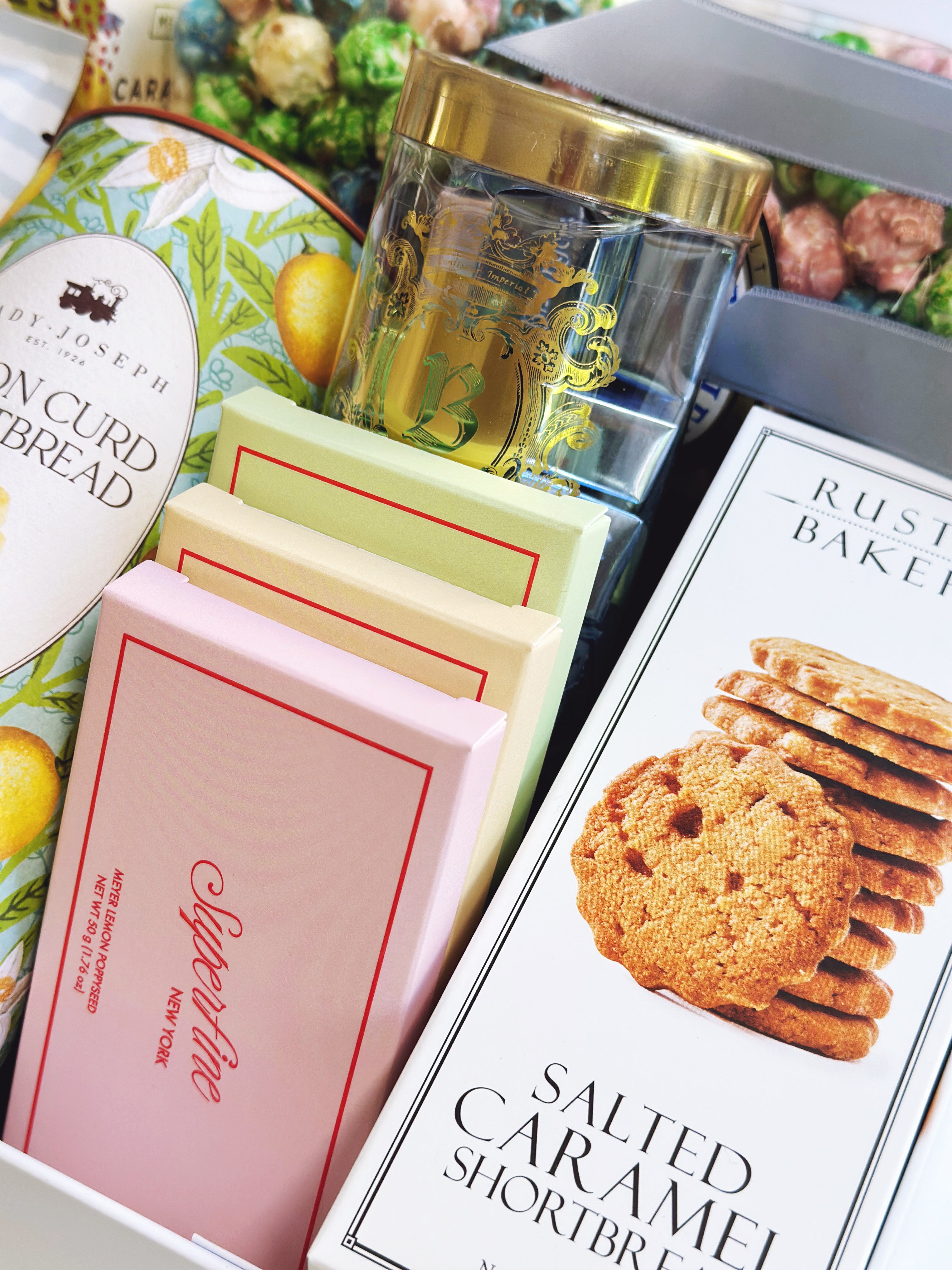 Poppins & Post The ULTIMATE treat box gift box with assorted sweet treats and decorative packaging.