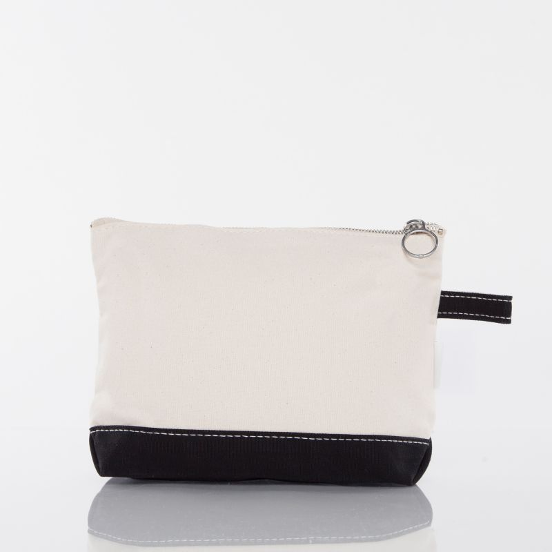A small zippered pouch with a cream canvas body, a black bottom panel, white contrast stitching, and a silver metal ring pull on a white background.