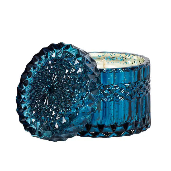 Gift-wrapped blue spruce crystal candle from Poppins & Post, featuring a decorative candle with crystal accents and elegant wrapping.