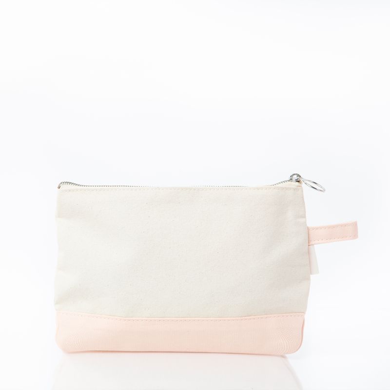 A small rectangular zip pouch with a cream canvas upper section and a light blush pink bottom panel, featuring a silver zipper and a matching pink loop handle on the right side.