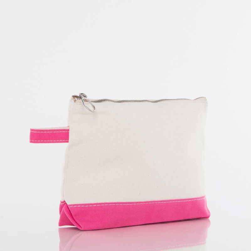 A rectangular canvas pouch with a cream-colored body and a vibrant pink bottom base and matching pink zipper pull tab, shown on a reflective white surface.