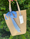 Natural jute event tote bag by Poppins & Post with sturdy handles and spacious interior for eco-friendly carrying.