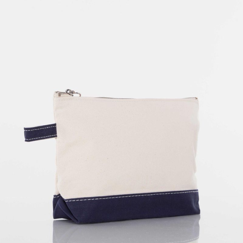 Beige pouch with navy blue bottom section on a white background