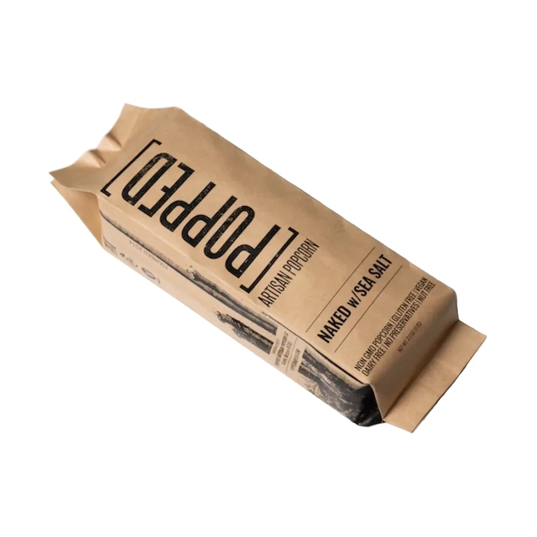 Kraft paper packaging of Popped Popcorn on a white background